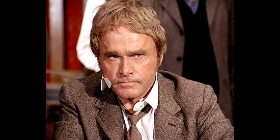Bill McKinney as Ramsey Bass, a gambler not happy with the way the game is going and determined to get even with Maverick in Bret Maverick, The Lazy Ace (1981)