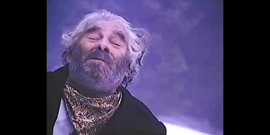 Bob Damon as Israel Swan, desperately hoping his companions have come across food in The Legend of Alfred Packer (1980)