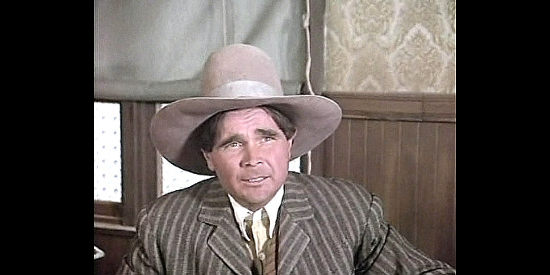 Buck Taylor as Joe McBride, a ranch hand doing Vern Tyree's bidding in Wild Times (1980)