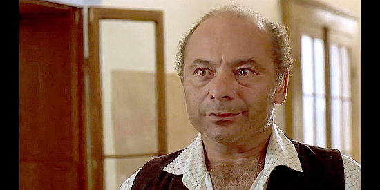 Burt Young as Andrews, the killer whose henchmen Berrigan hires to move the growers off their land in Blood Red (1989)
