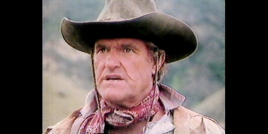 Charles Napier as Wolfson Lucas in Outlaws (1986)