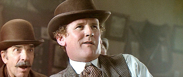 Colm Meaney as Mike Kelly, making money of Joseph Donnelly's boxing ability in Far and Away (1992)