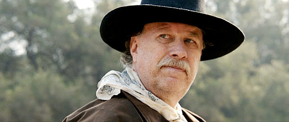 Darrell Mapson as Quinn, trying to hold his gang together after a train robbery in Lost Outlaw (2021)