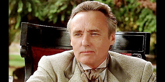Dennis Hopper as William Berrigan, a railroad tycoon determined to own the California vineyards in Blood Red (1989)