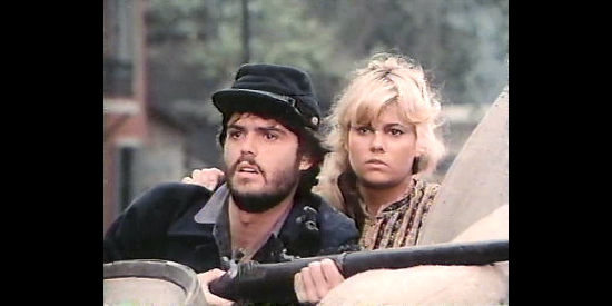 Donny Osmond as Frank Isaacs and Lisa Whelchel as Amy Cole, watching for another advance by the Union renegades in The Wild Women of Chastity Gap (1983)