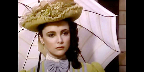 Emma Samms as Mirabelle Merriweather, assistant to English agent Sir David Ebney in More Wild, Wild West (1980)