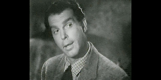 Fred MacMurray as Gil Farra, proposing to Sharon McCloud in spite of his better judgment in Rangers of Fortune (1940)