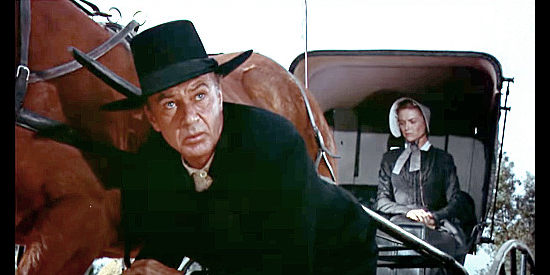 Gary Cooper as Jess Birdwell waits for a chance to show off the speed of his new horse, Lady, in Friendly Persuasion (1956)