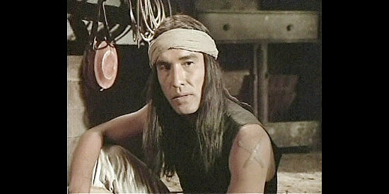 Geno Silvo as Ibran, the Apache brave who helps Hugh Cardiff recover from a wound in Wild Times (1980)