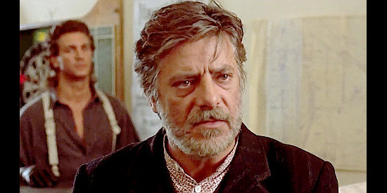 Giancarlo Giannini as Sebastian Collogero, the vineyard owner who refuses to sell out to the railroad in Blood Red (1989)