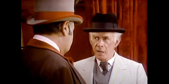 Harry Morgan as Secret Service Chief Robert T. 'Skinn' Malone, confronting Paradine in More Wild, Wild West (1980)