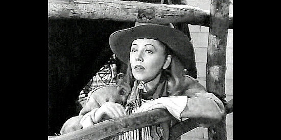 Isabel Jewell as Belle Starr, anticipating a horse race against Mark Rowley in Badman's Territory (1946)