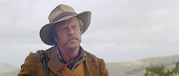 Jack Thompson as Clancy, the guide Harrison relies on to find the wild herd of horses in The Man from Snowy River (1982)