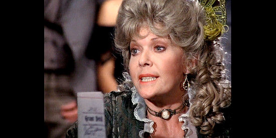 Janis Page as Mandy Packer, betting the deed to her saloon without telling anyone about the mortgage on it in Bret Maverick, The Lazy Ace (1981)