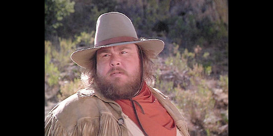 John Candy as James Harlow, drunk for 20 years before signing on as wagon master in Wagons East (1994)