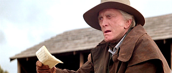 Kirk Douglas as Harrison, the rancher who knows his horses better than his growing daughter Jessica in The Man from Snowy River (1982)