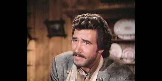 Lee Horsley as Capt. John Cain, giving Maggie a pre-surgery pep talk in The Wild Women of Chastity Gap (1983)