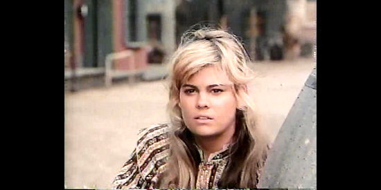 Lisa Whelchel as Amy Cole, the aspiring nurse who winds up falling for a 'blue belly' in The Wild Women of Chastity Gap (1983)