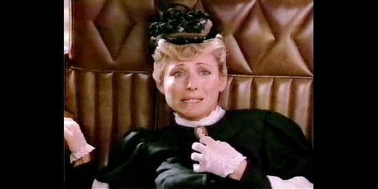 Lori Hallier as Sally Wells, the pregnant stage passenger the Everetts rescue in The Gunfighters (1987)