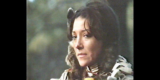 Mindi Miller as Wannetta, the Paiute woman Colter kidnaps to care for his child in Sacred Ground (1983)