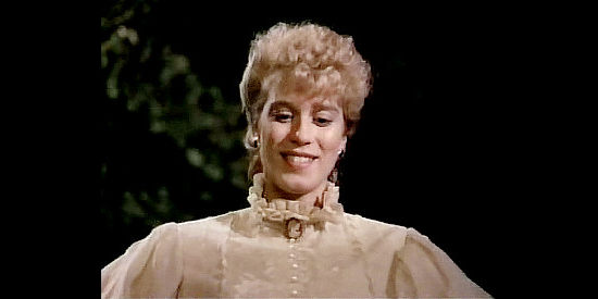 Moira Walley-Beckett as Lorna, the pretty girl who catches Matt snitching food at her party in The Gunfighters (1987)