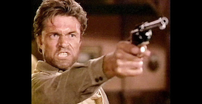 Art Hinkle as Cole Everett with Deke Turner under his gun in The Gunfighters (1987)