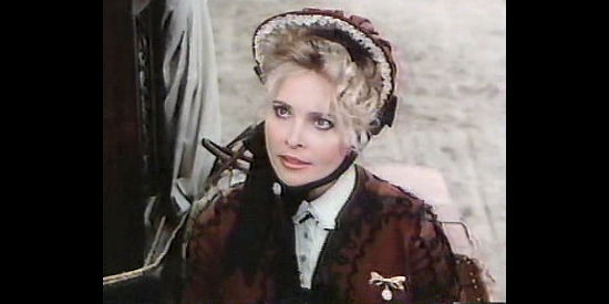 Priscilla Barnes as Maggie McCulloch, a lady doctor summoned to a Sweetwater bordello in The Wild Women of Chastity Gap (1983)