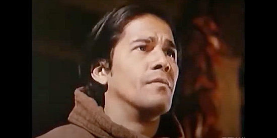 Rafael Campos as Father Alvaro, the priest who tries to comfort Devlin on the eve of his hanging in The Hanged Man (1974)