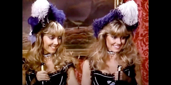 Randi Brough as Yvonne and Candi Brough as Daphne, Paradine's pretty assistants in More Wild, Wild West (1980)
