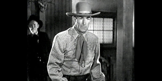Randolph Scott as Mark Rowley, determined to bring some sense of law and order to Quinto in Badman's Territory (1946)