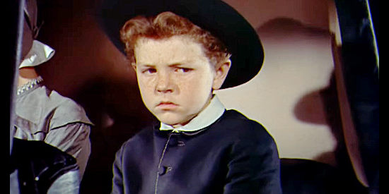 Richard Eyler as Little Jess Birdwell, angry at his mother's pet goose in Friendly Persuasion (1956)