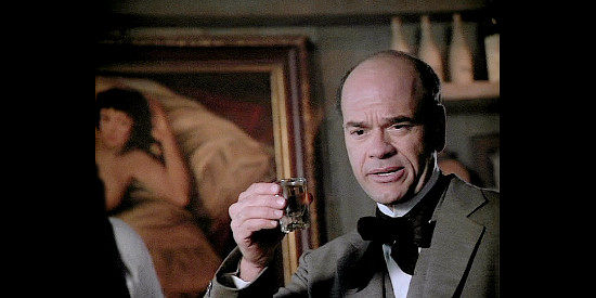 Robert Picardo as Ben Wheeler, a banker ready to say farewell to Prosperity after three robberies in one month by the same gang in Wagons East (1994)