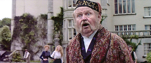 Robert Prosky as Daniel Christie, reacting when Joseph Donnelly shows up at his home, intent on vengeance in Far and Away (1992)
