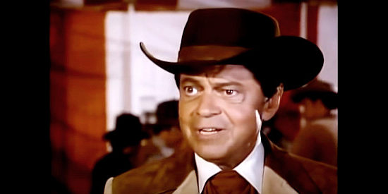 Ross Martin as Artemus Gordon, wondering how to stop someone who can become invisible in More Wild, Wild West (1980)