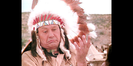 Russell Means as the Indian chief who agrees to provide protection to the wagon train because he likes the idea of Wagons East (1994)
