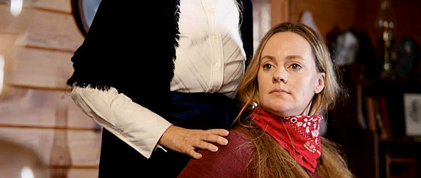 Shannon SInclair as Sadie, tied up but being conforted by her mother in Lost Outlaw (2021)
