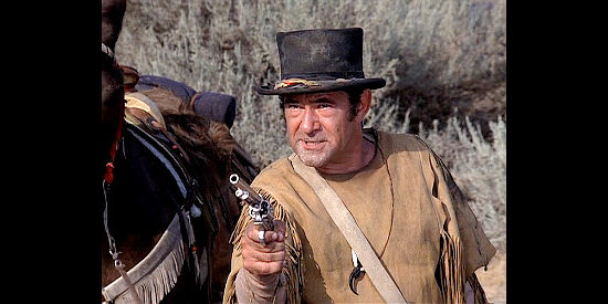 Stuart Margolin as Philo Sandeen, aka Standing Bear, convincing Maverick to hire him as a tracker in Bret Maverick, The Lazy Ace (1981)