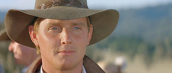 Tom Burlinson as Jim Craig, his reunion with Jessica turning out not quite as joyous as he had hope in Return to Snowy River (1988)