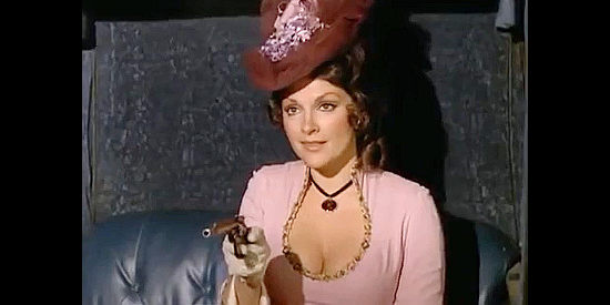 Trisha Noble as Penelope, a British agent interrupting the investigation by West and Gordon in The Wild, Wild West Revisited (1979)
