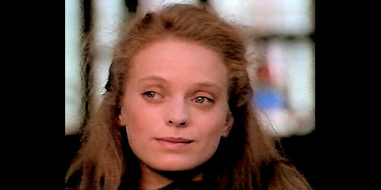 Tushka Bergen as Alice May Richards, hatching her plan to save Minnamurra in The Wrangler (1989)