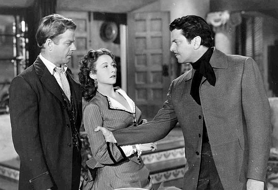 William Ching as John Hale, Vera Ralston as Violet Barton and John Carroll as Gregg Delaney in Surrender (1950)