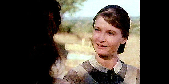 Beata Pozniak as Kristine Reinmuller, one of Abbie's first friends in Nebraska in A Mother's Gift (1995)