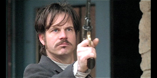 Bill Paxton as Frank James, coming to Jesse's rescue in Frank and Jesse (1994)