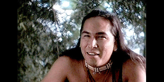Eric Schweig as Wildcat, the Shawnee chief who takes a liking to Mary Ingles in Follow the River (1995)