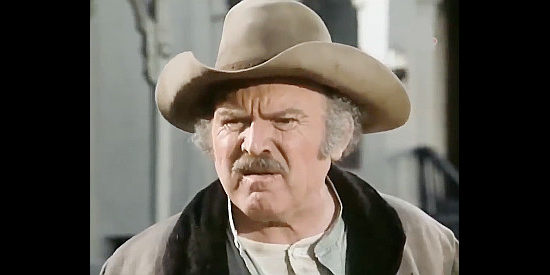 Gene Evans as Marshal Connelly, the aging lawman watching over Coffeyville in The Last Day (1975)