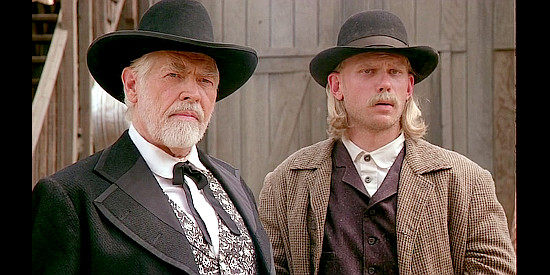James Coburn as Cyrus B. Bloomington and Mark Pellegrino as his henchman Frank Bonner in The Cherokee Kid (1996)