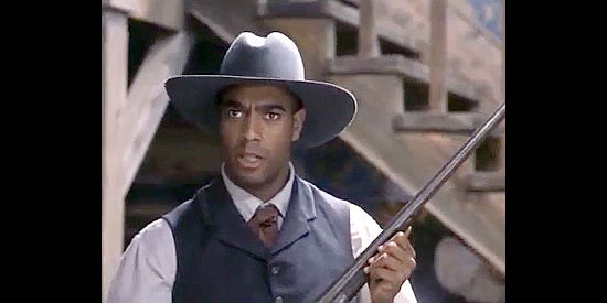 Jeffrey D. Sams as Adam Clayborne, ready to confront troublemakers from Texas in Rose Hill (1997)