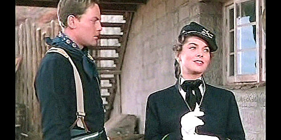 John Agar as Lt. Flint Cohill noticing the yellow ribbon Olivia Dandridge (Joanne Dru) is wearing in She Wore a Yellow Ribbon (1949)