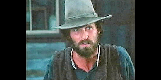 Lance LeGault as Joe Wormser, welcoming the Sergeant family to Wyoming in Pioneer Woman (1973)