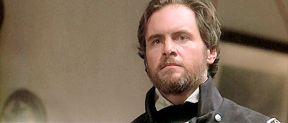 Mark Moss as Col. Benton Lacy, asking for mercy for the captured American deserters in One Man's Hero (1999)
